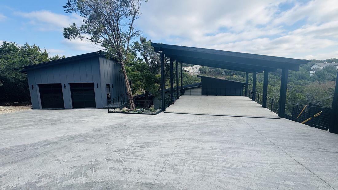 Completed steel-frame home & carport