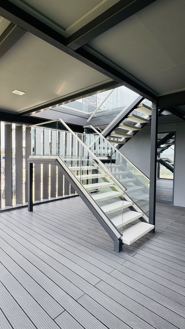 Interior steel stair & glass rail